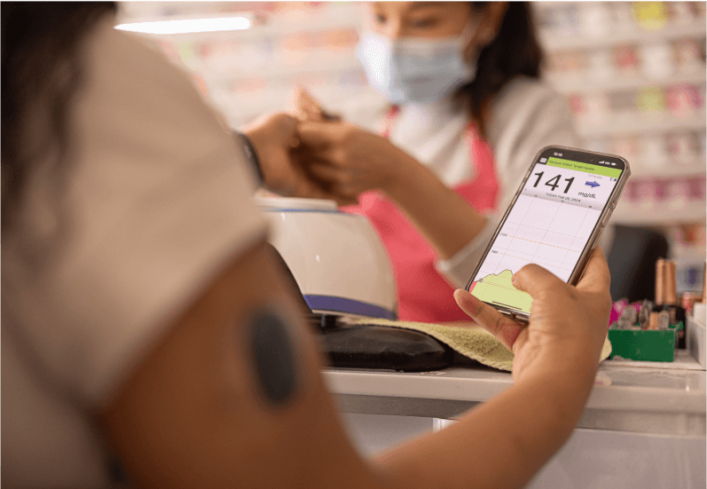 Eversense user uses the Eversense CGM system for diabetes management. 